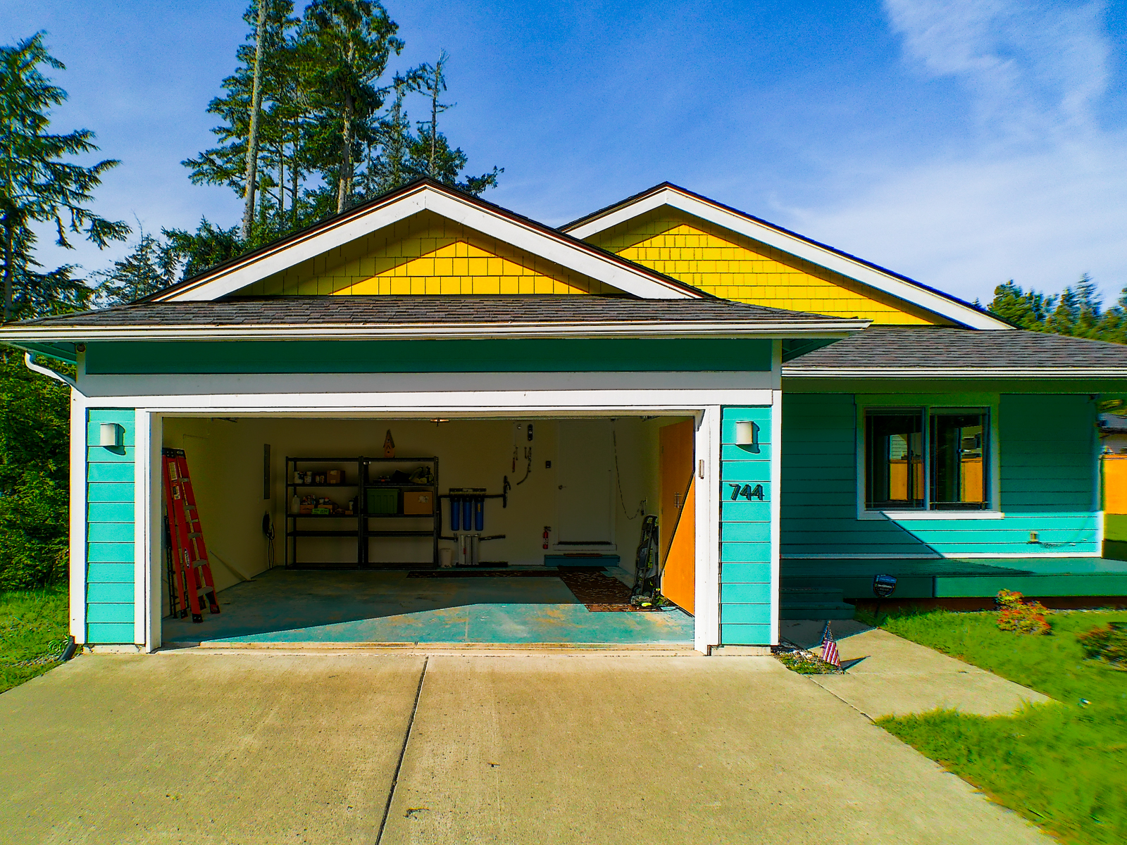 The attached two-car garage offers generous space with direct access to the home.